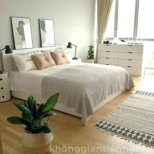 Một mẫu giường ngủ gỗ được thiết kế theo tông màu trắng đẹp, không gian phòng ngủ cũng tận dụng tối đa ánh sáng tự nhiên.